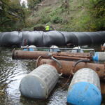 Bypass Pipes beneath AquaDams, Seattle WA 2010